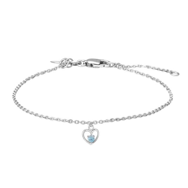 Rhod. silver bracelet heart w/light blue cz 